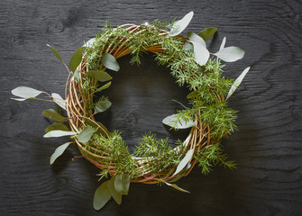 DIY wreath made from eucalyptus and fir tree decoration. © Sami