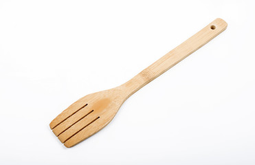 Wooden fork on white background. Isolated.