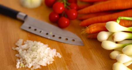 Young Woman Cooking in the kitchen. Healthy Food