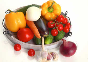 Fresh autumn vegetables on a white background