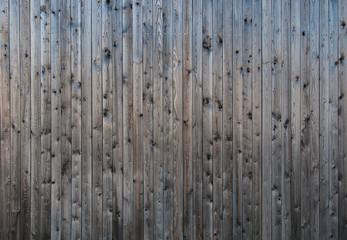 Gray boards of wood grange background texture