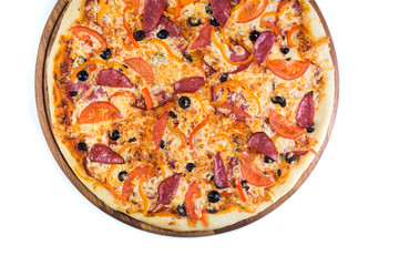 Pizza on light wooden background top view.