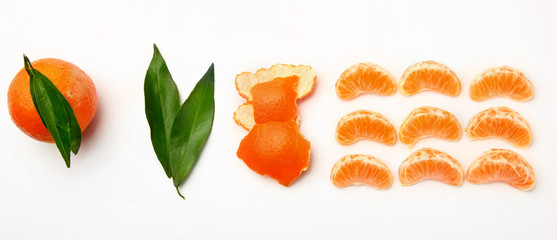 Gradual peeling of tangerine on white background.