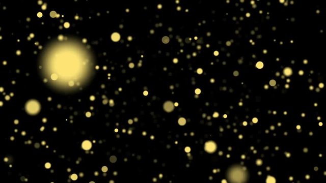 Gold flowing blinking particles on black background