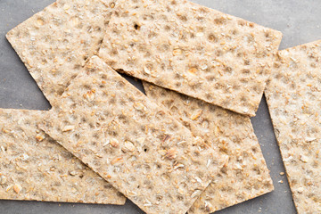 Stack of wholegrain crispy bread with sunflower, chia and sesame