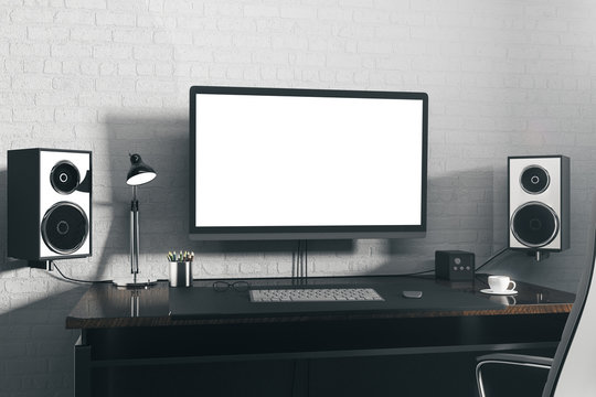 Designer desktop with white computer