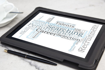 tablet with consulting word cloud