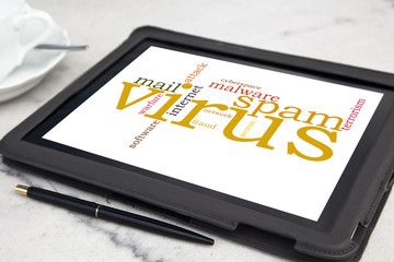 tablet with computer virus word cloud