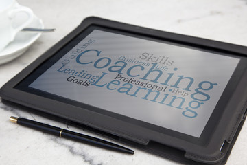 tablet with personal coaching word cloud