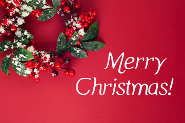 merry christmas. wreath on red background