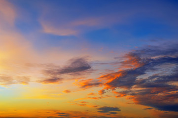 Fototapeta na wymiar Burning clouds, with a big color range at sunset
