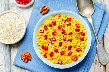 Turmeric quinoa with pomegranate and walnuts