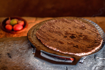 Hot homemade flatbread made of sorghum flour