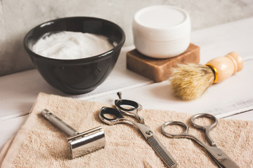 Mens hairdressing wooden desktop with tools for shaving
