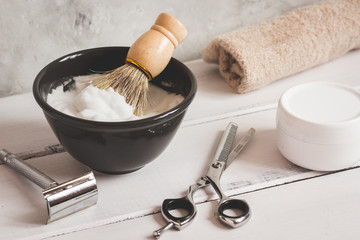 Mens hairdressing wooden desktop with tools for shaving