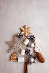 Beautiful Christmas tree made of gingerbread, marshmallows and Christmas decoration on light background