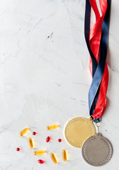 Concept of doping in sport - deprivation medals top view