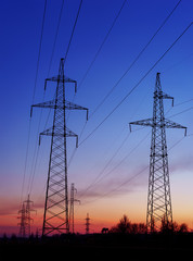 silhouette of high voltage electrical pole structure.
