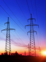 Fototapeta premium silhouette of high voltage electrical pole structure.