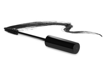 Stroke of black mascara with applicator brush close-up, isolated