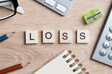 Business and marketing conceptual word spelled with game wooden blocks