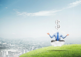 Headless meditating businessman