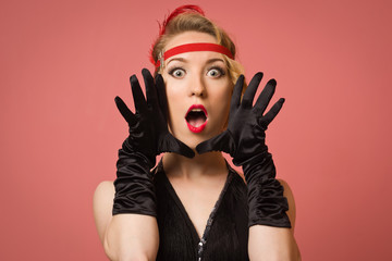 pretty actress in black retro dress with headband