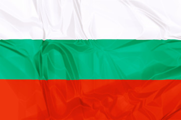Fototapeta premium The national Bulgaria waving flag in 3d background.