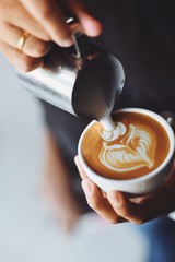 coffee latte art in coffee shop - obrazy, fototapety, plakaty