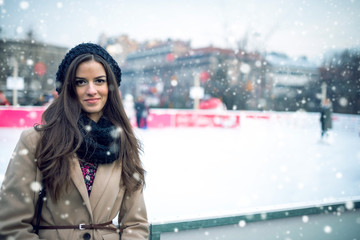 Woman posing at outdoor ice-skating park