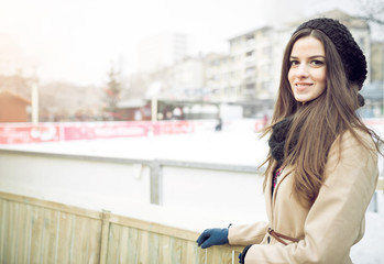 Woman posing at outdoor ice-skating park