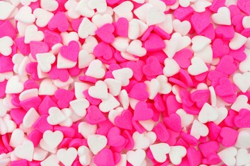 Valentines Day pink and white heart candy sprinkles background