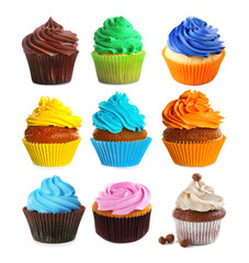 Set of delicious cupcakes on white background