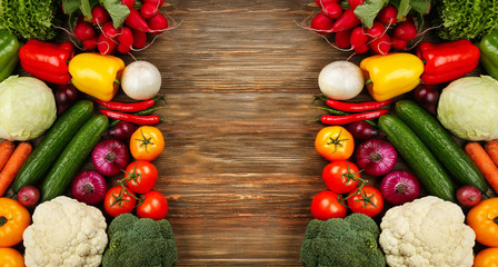 Fresh vegetables on wooden background