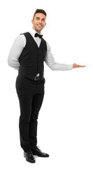 Handsome young waiter on white background