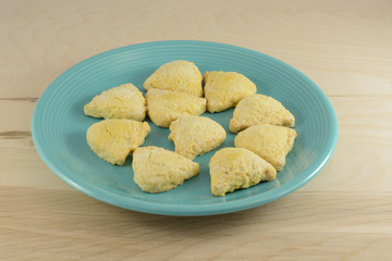 Blue plate full of pumpkin scones