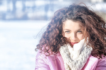 Beautiful young woman outdoors on winter day