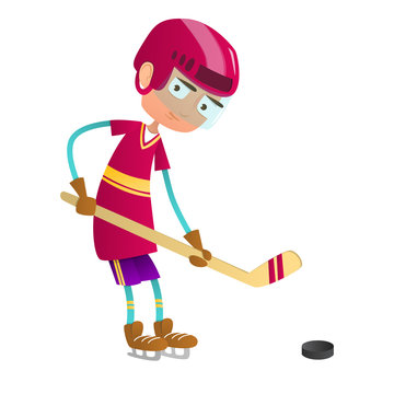 Cute teenage boy hockey player with hockey stick and puck
