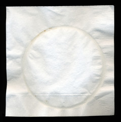 Cocktail napkin with drink circle stain