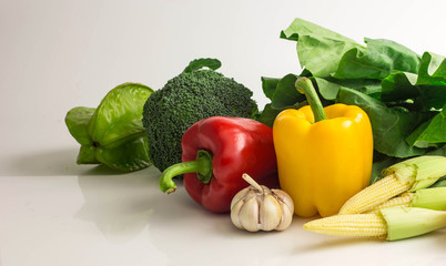 group of fresh vegetables on white