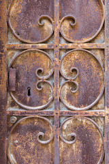 old ornated and rusted metal door
