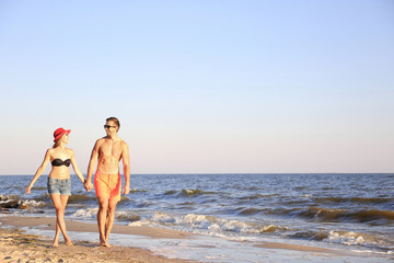 Fototapeta na wymiar Lovely couple on tropical beach