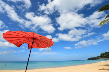 Beautiful sandy beach with umbrella 