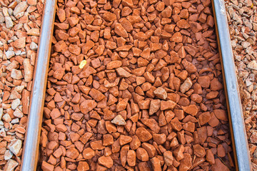 red rock and Railway Tracks , stone background