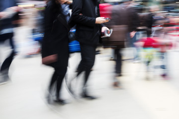 people at the station in motion blur