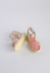 shoe or beautiful little girl shoes on a background.