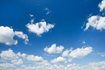 white fluffy clouds in the blue sky