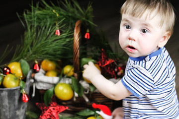 sweet little girl in dress with christmas basket