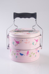Food Container Tiffin or food carrier on background.