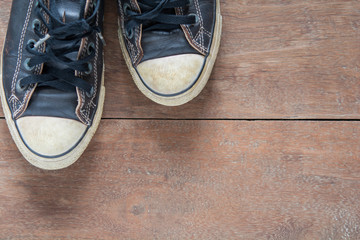 old shoes on a wooden deck